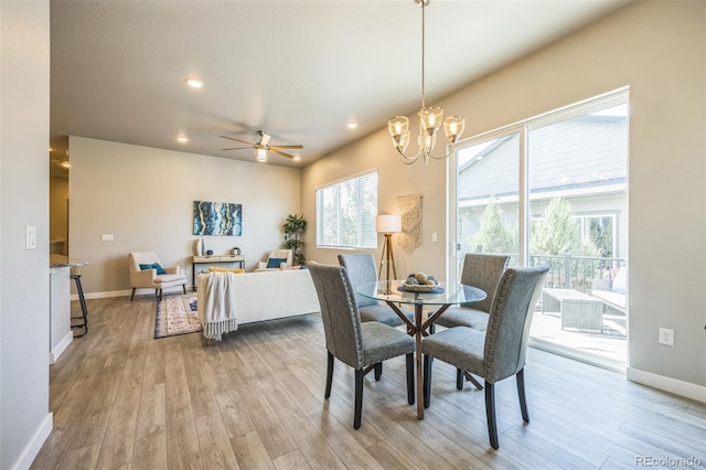 12574 Lake View St, Longmont, CO 80504 - dining space featuring wood finished floors, a ceiling fan, recessed lighting, baseboards, and a chandelier