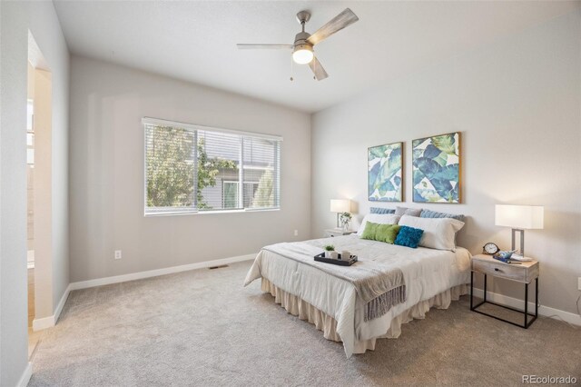 12574 Lake View St, Longmont, CO 80504 - bedroom featuring light carpet, baseboards, and a ceiling fan