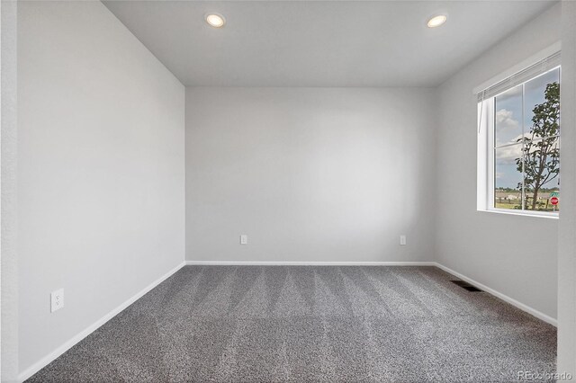 2705 73rd Avenue Ct, Greeley, CO 80634 - carpeted spare room featuring plenty of natural light, recessed lighting, and baseboards