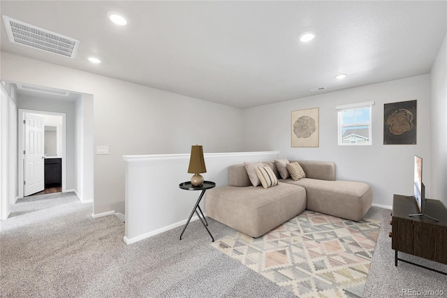 2705 73rd Avenue Ct, Greeley, CO 80634 - living area featuring carpet floors, baseboards, and recessed lighting