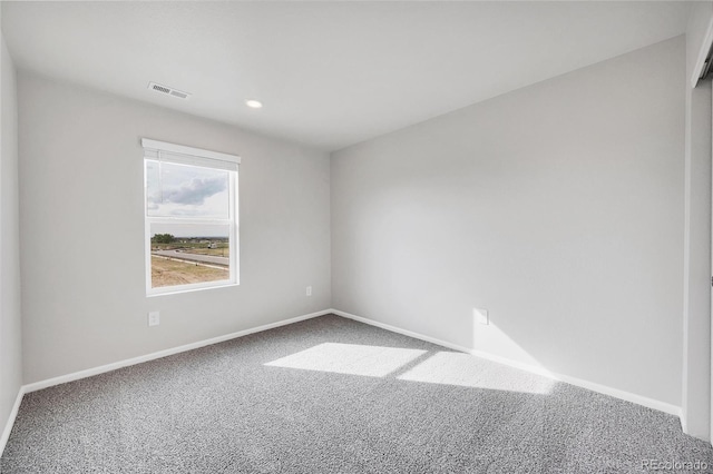 2705 73rd Avenue Ct, Greeley, CO 80634 - empty room with carpet flooring, baseboards, and recessed lighting