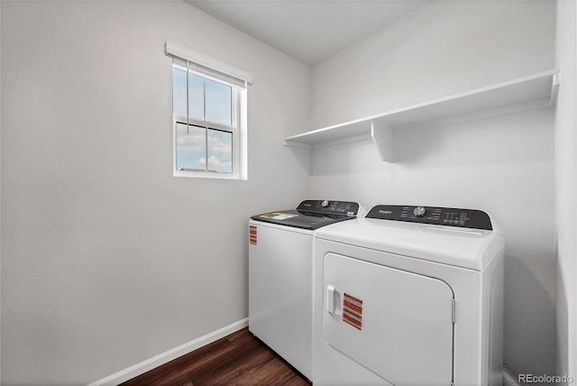 2705 73rd Avenue Ct, Greeley, CO 80634 - laundry area featuring washer and clothes dryer, baseboards, and dark wood-style floors