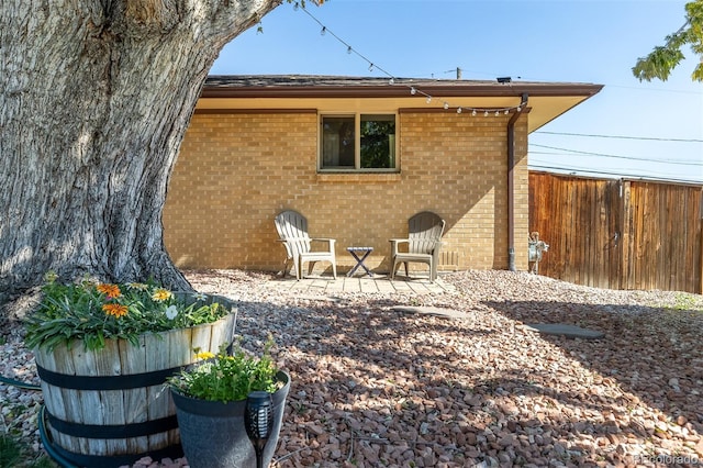 rear view of property with a patio area