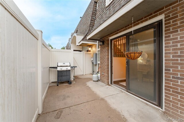 15491 E Wyoming Dr Unit A, Aurora, CO 80017 - view of patio featuring area for grilling