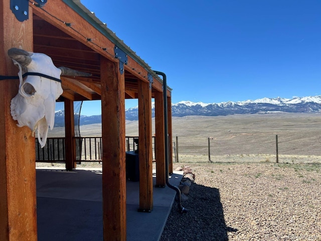 view of patio / terrace with a mountain view