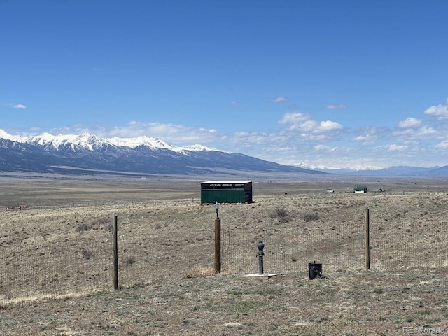 view of mountain feature with a rural view