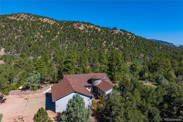 exterior space featuring a mountain view