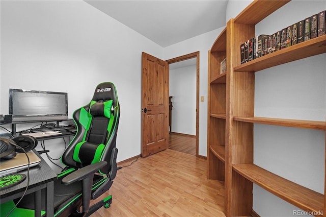 office space with light wood-type flooring