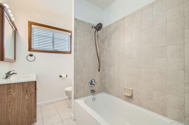 full bath with washtub / shower combination, baseboards, toilet, tile patterned floors, and vanity