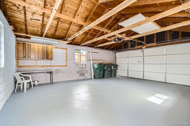 garage featuring a garage door opener