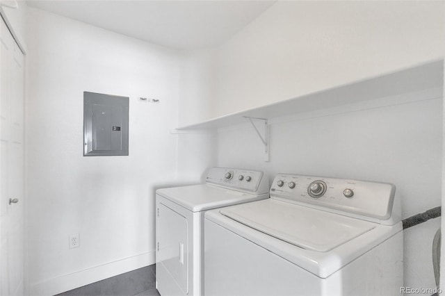 laundry room featuring washing machine and dryer and electric panel