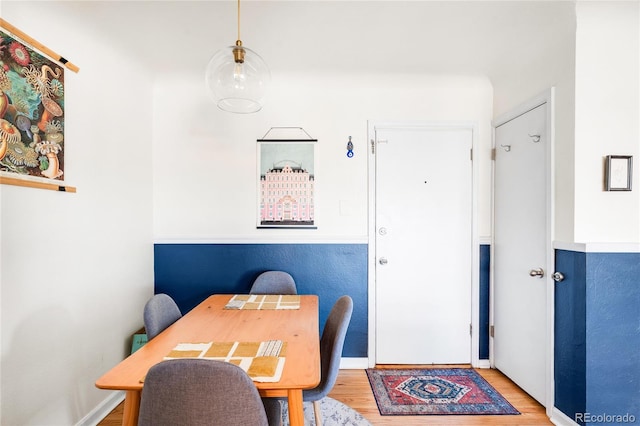 85 N Grant St Unit 30, Denver, CO 80203 - dining area with baseboards and wood finished floors