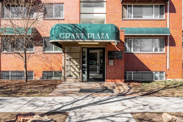 85 N Grant St Unit 30, Denver, CO 80203 - property entrance featuring brick siding