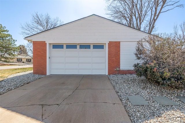 garage featuring driveway