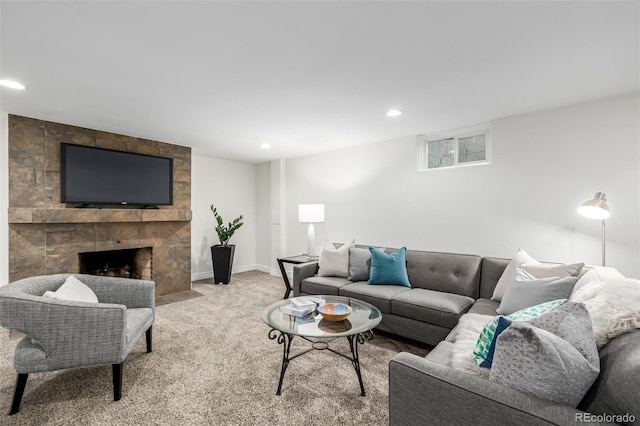 living area with recessed lighting, baseboards, a fireplace, and carpet flooring