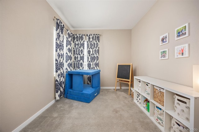 playroom with baseboards and carpet floors
