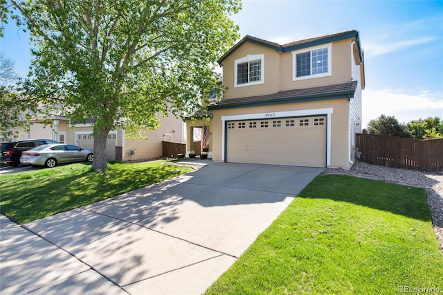 4963 Collingswood Dr, Highlands Ranch, CO 80130 - traditional-style house featuring concrete driveway, a garage, and stucco siding