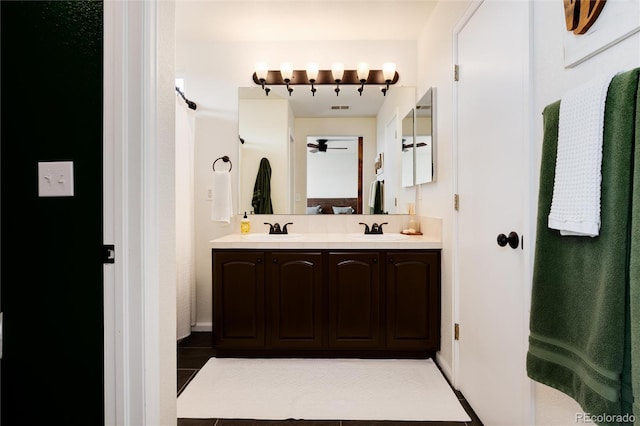 4963 Collingswood Dr, Highlands Ranch, CO 80130 - bathroom featuring ceiling fan and double vanity