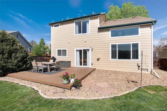 4963 Collingswood Dr, Highlands Ranch, CO 80130 - rear view of property with a wooden deck, outdoor dining area, fence, and cooling unit