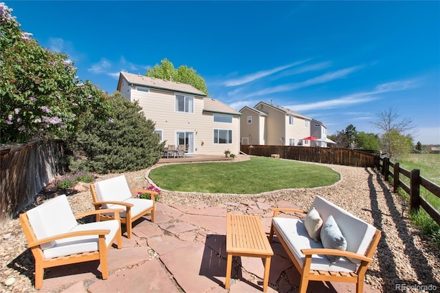 4963 Collingswood Dr, Highlands Ranch, CO 80130 - rear view of house featuring a patio and an outdoor hangout area