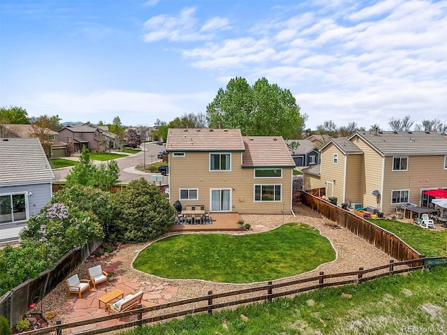 4963 Collingswood Dr, Highlands Ranch, CO 80130 - back of property featuring a patio and a residential view