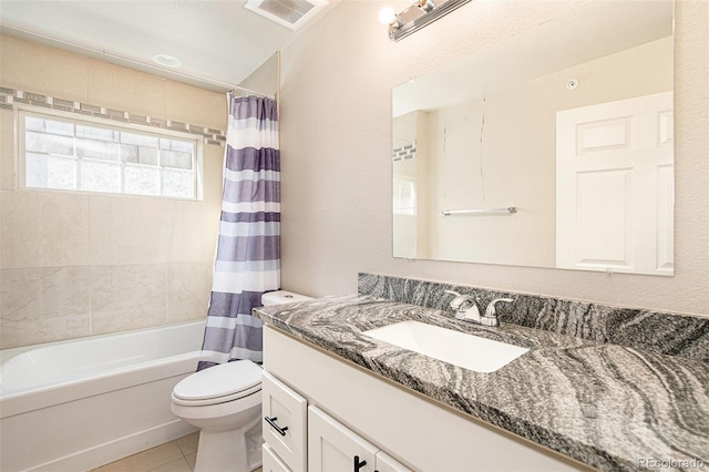 full bathroom with vanity, toilet, shower / bath combo, and tile patterned flooring