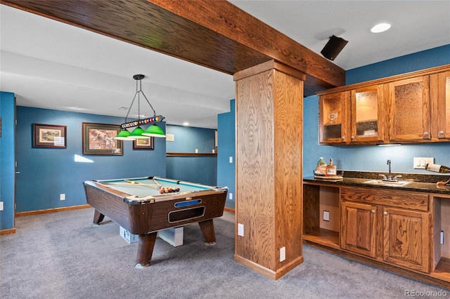 rec room with indoor wet bar, pool table, and light carpet