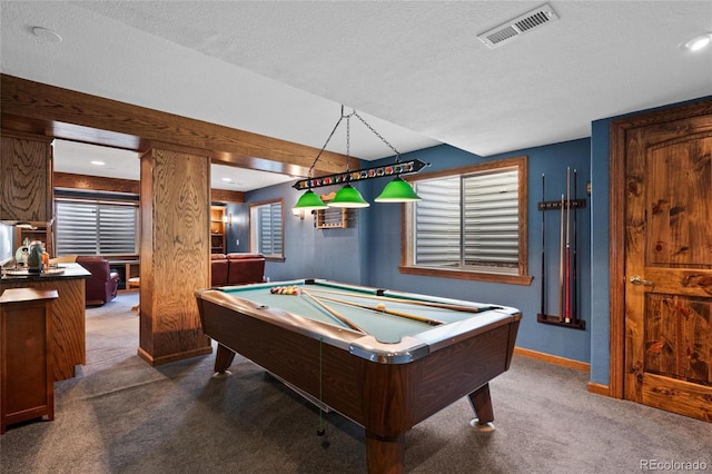 recreation room with pool table, carpet, and a textured ceiling