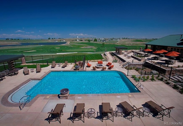 view of swimming pool featuring a patio