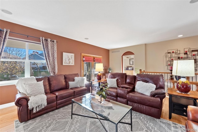 living room with light hardwood / wood-style floors