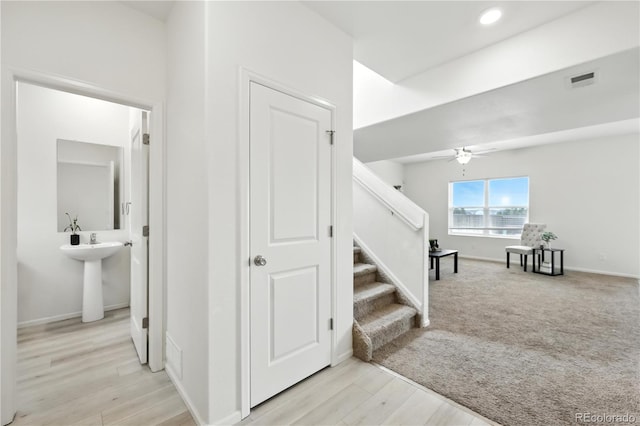 9723 Borderpine Way, Colorado Springs, CO 80925 - stairs featuring a ceiling fan, recessed lighting, and wood finished floors