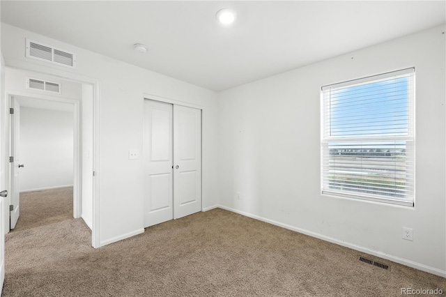 9723 Borderpine Way, Colorado Springs, CO 80925 - unfurnished bedroom featuring carpet flooring and a closet