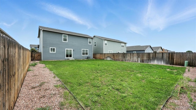 9723 Borderpine Way, Colorado Springs, CO 80925 - rear view of property with a fenced backyard