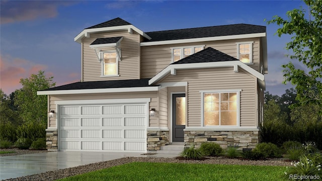 view of front of property featuring a garage