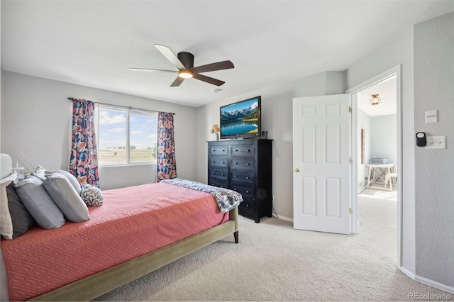 7977 Emerson Ave, Frederick, CO 80530 - bedroom with light colored carpet and a ceiling fan