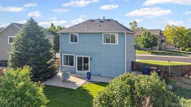 7977 Emerson Ave, Frederick, CO 80530 - rear view of house with a patio area