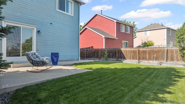 7977 Emerson Ave, Frederick, CO 80530 - fenced yard with a patio area