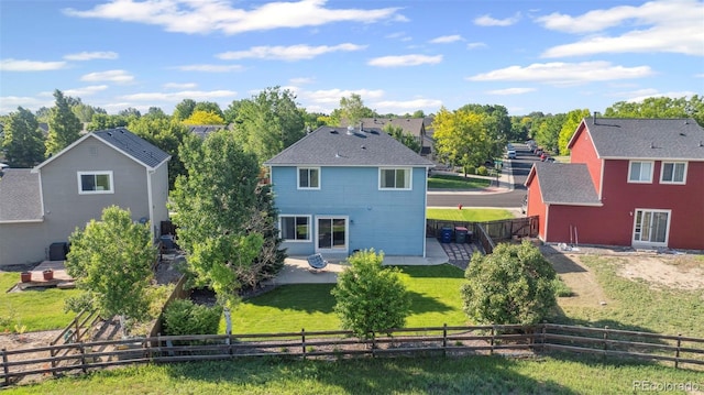 7977 Emerson Ave, Frederick, CO 80530 - back of house featuring a patio and a fenced backyard