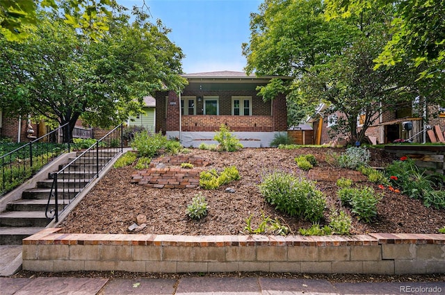 3321 Stuart St, Denver, CO 80212 - view of front of property featuring brick siding and stairs