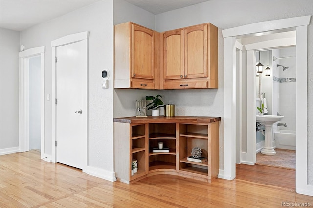 3321 Stuart St, Denver, CO 80212 - bar area featuring light wood-style flooring and baseboards