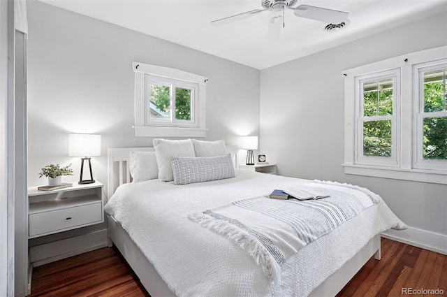 3321 Stuart St, Denver, CO 80212 - bedroom featuring multiple windows, wood finished floors, baseboards, and ceiling fan