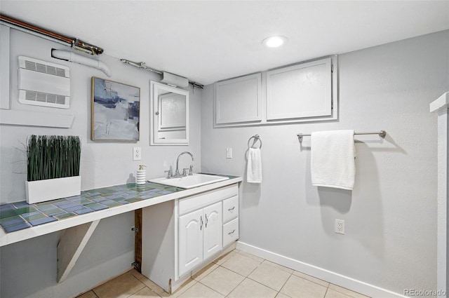 3321 Stuart St, Denver, CO 80212 - washroom with a sink, heating unit, light tile patterned floors, baseboards, and recessed lighting