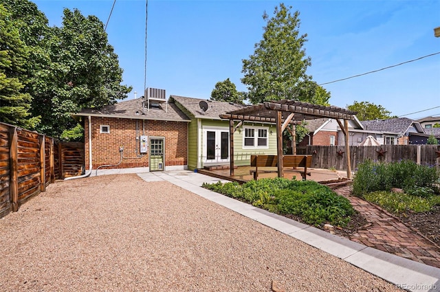 3321 Stuart St, Denver, CO 80212 - back of house featuring french doors, a pergola, a fenced backyard, brick siding, and a patio area