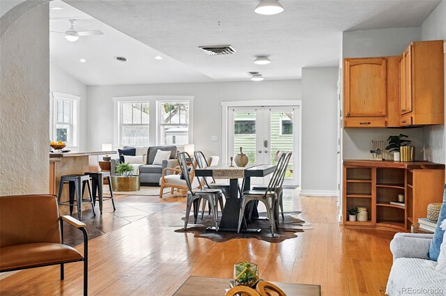 3321 Stuart St, Denver, CO 80212 - dining room featuring a ceiling fan, light wood finished floors, french doors, recessed lighting, and vaulted ceiling