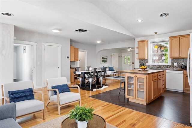 3321 Stuart St, Denver, CO 80212 - living room featuring vaulted ceiling, dark wood-style flooring, arched walkways, a ceiling fan, and recessed lighting