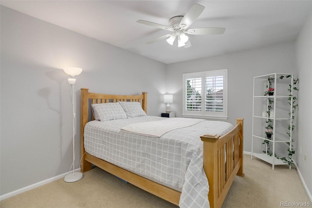 15372 E 117th Ave, Commerce City, CO 80022 - bedroom with light colored carpet, baseboards, and a ceiling fan