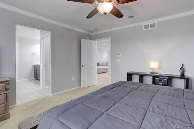 15372 E 117th Ave, Commerce City, CO 80022 - carpeted bedroom with crown molding, baseboards, a ceiling fan, and ensuite bath
