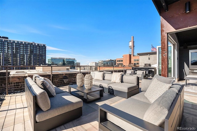 view of patio with a balcony and an outdoor hangout area