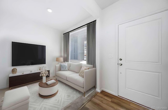 3869 N Shawnee St, Aurora, CO 80019 - living area featuring wood finished floors and baseboards