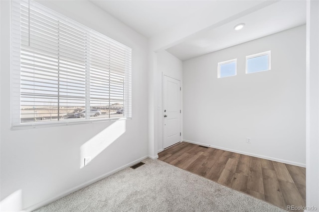 3869 N Shawnee St, Aurora, CO 80019 - empty room featuring baseboards and carpet flooring